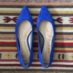 Suede royal blue flats with a leather bottom.